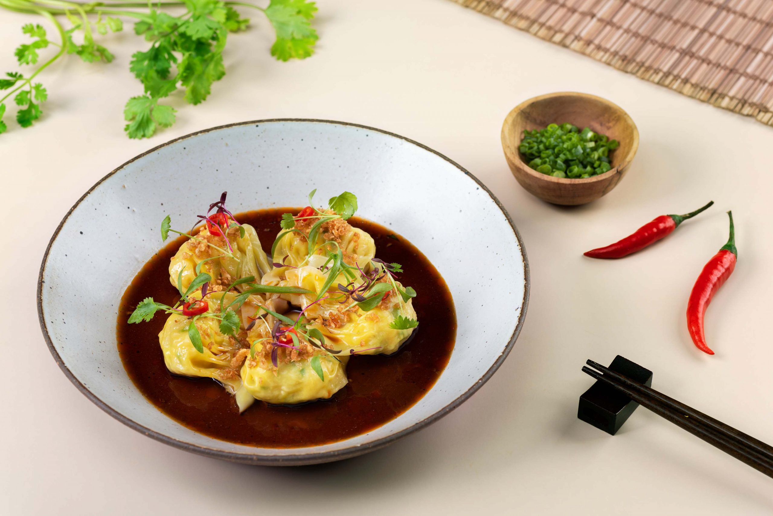 Flatlay of dimsum baskets with a variety of dim sums